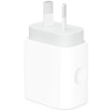 An Apple 20W USB-C Power Adapter on a white surface.