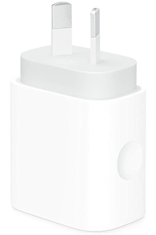 An Apple 20W USB-C Power Adapter on a white surface.