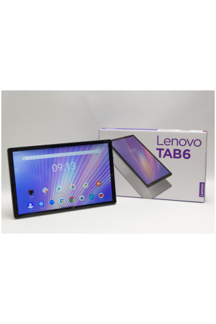 Lenovo tab 6 - 64GB (WiFi + Cellular) tablet in front of the box.